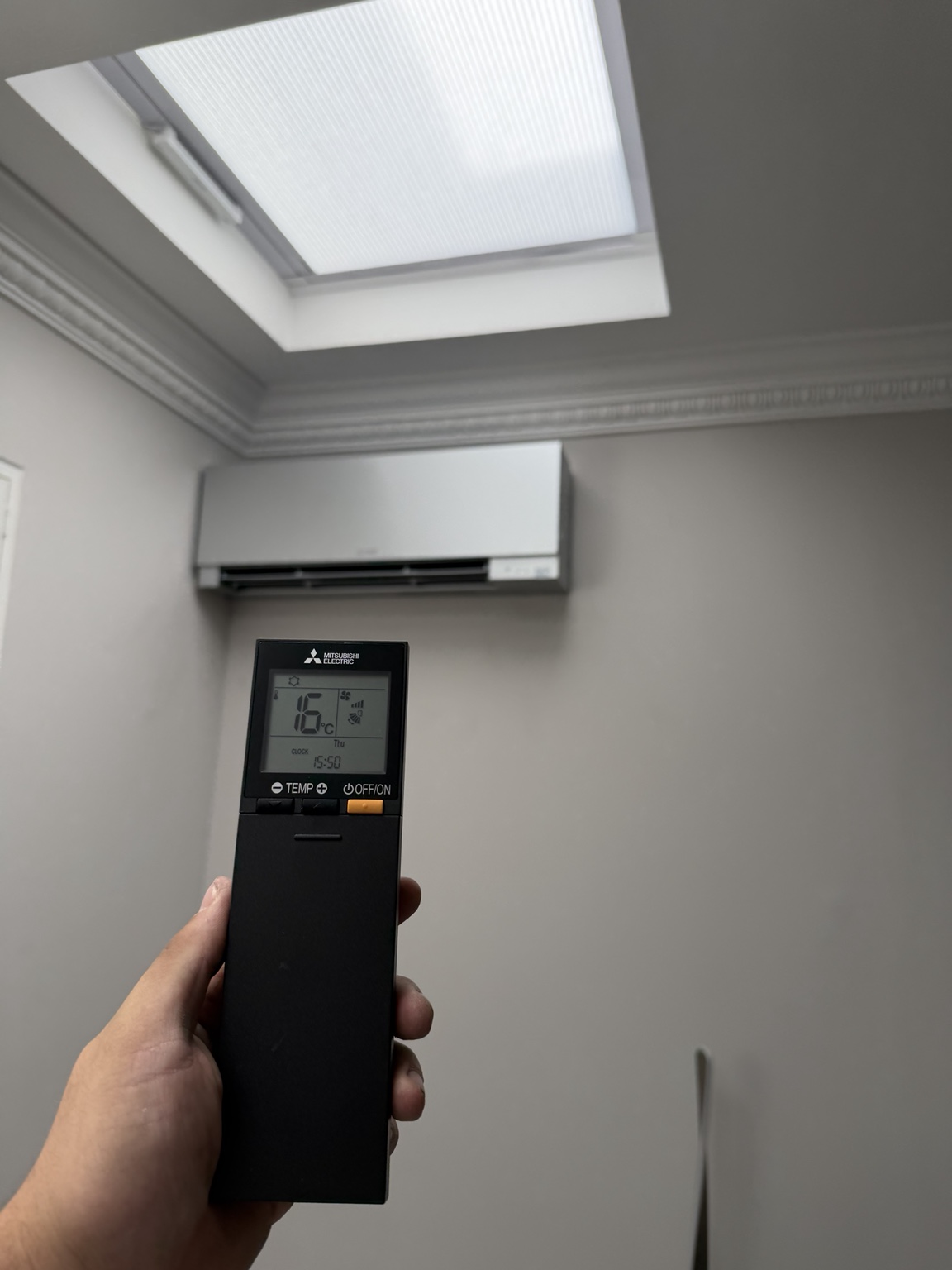 Mitsubishi Electric wall-mounted air conditioning installation photographed by ProAir